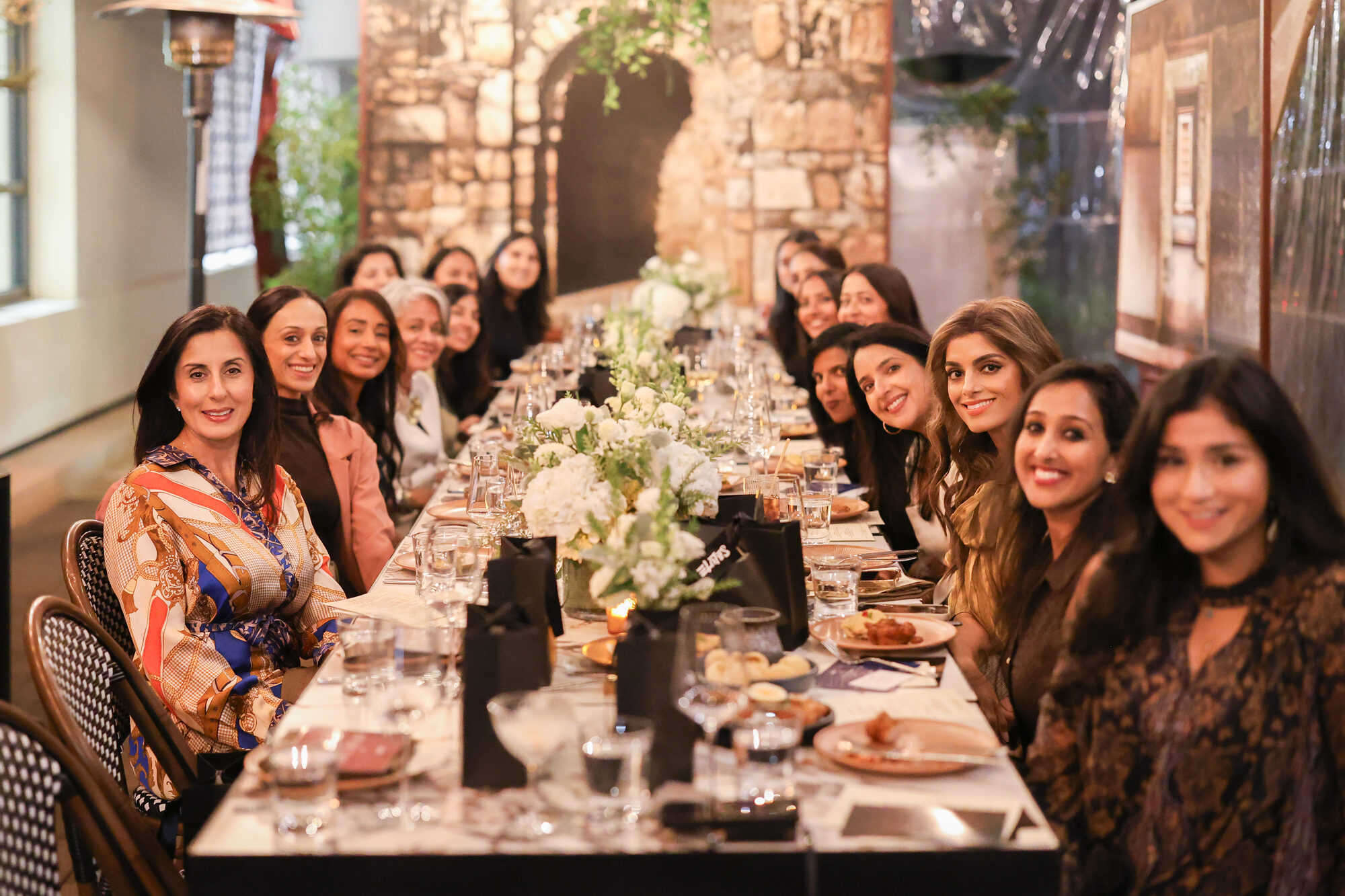 SALUTE members together at a long dinner table